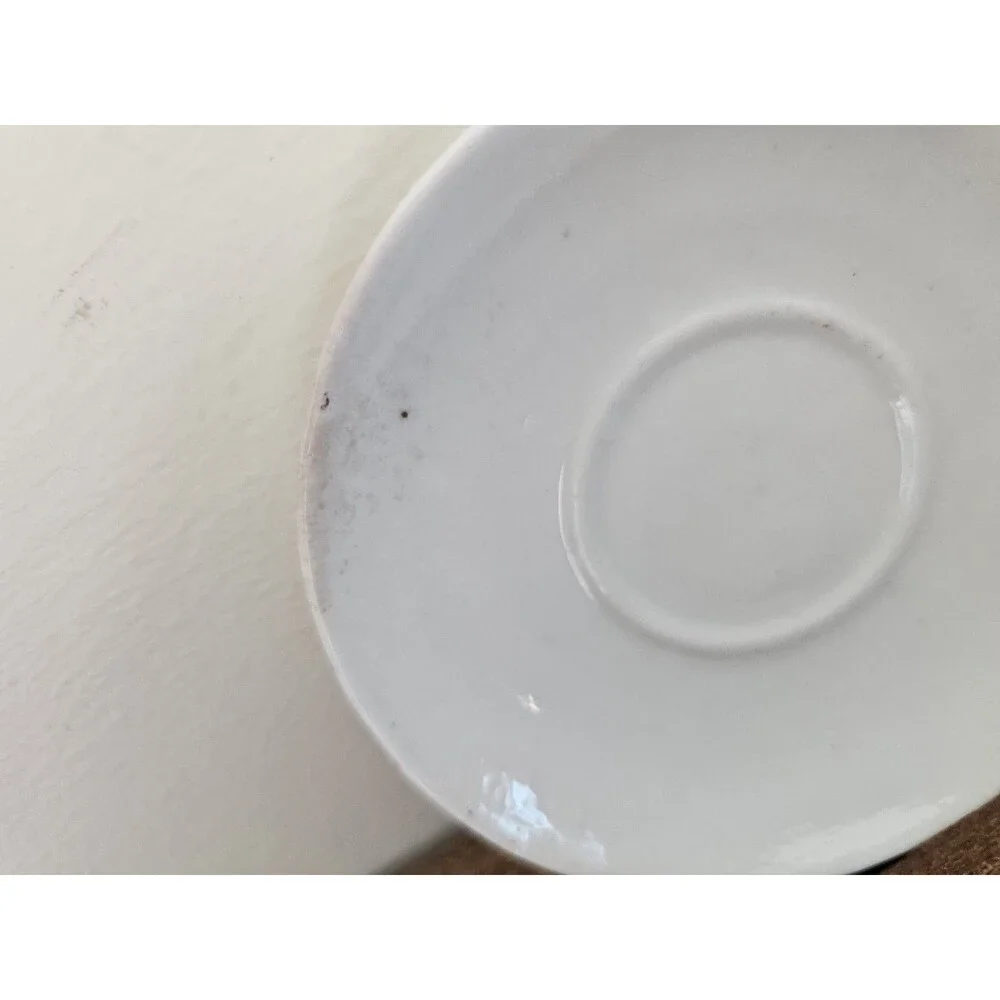 2 White Demitasse Saucers